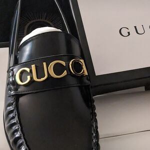 Gucci Black Leather Loafers with Gold Accent